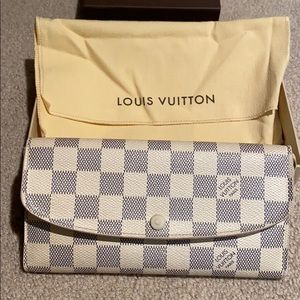 Louis Vuitton Emile wallet.